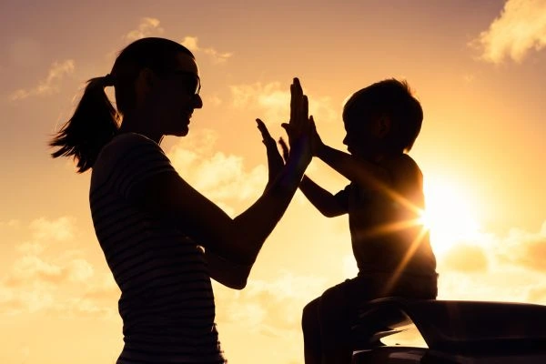 Image of happy mother and child after resolving child arrangements Taunton